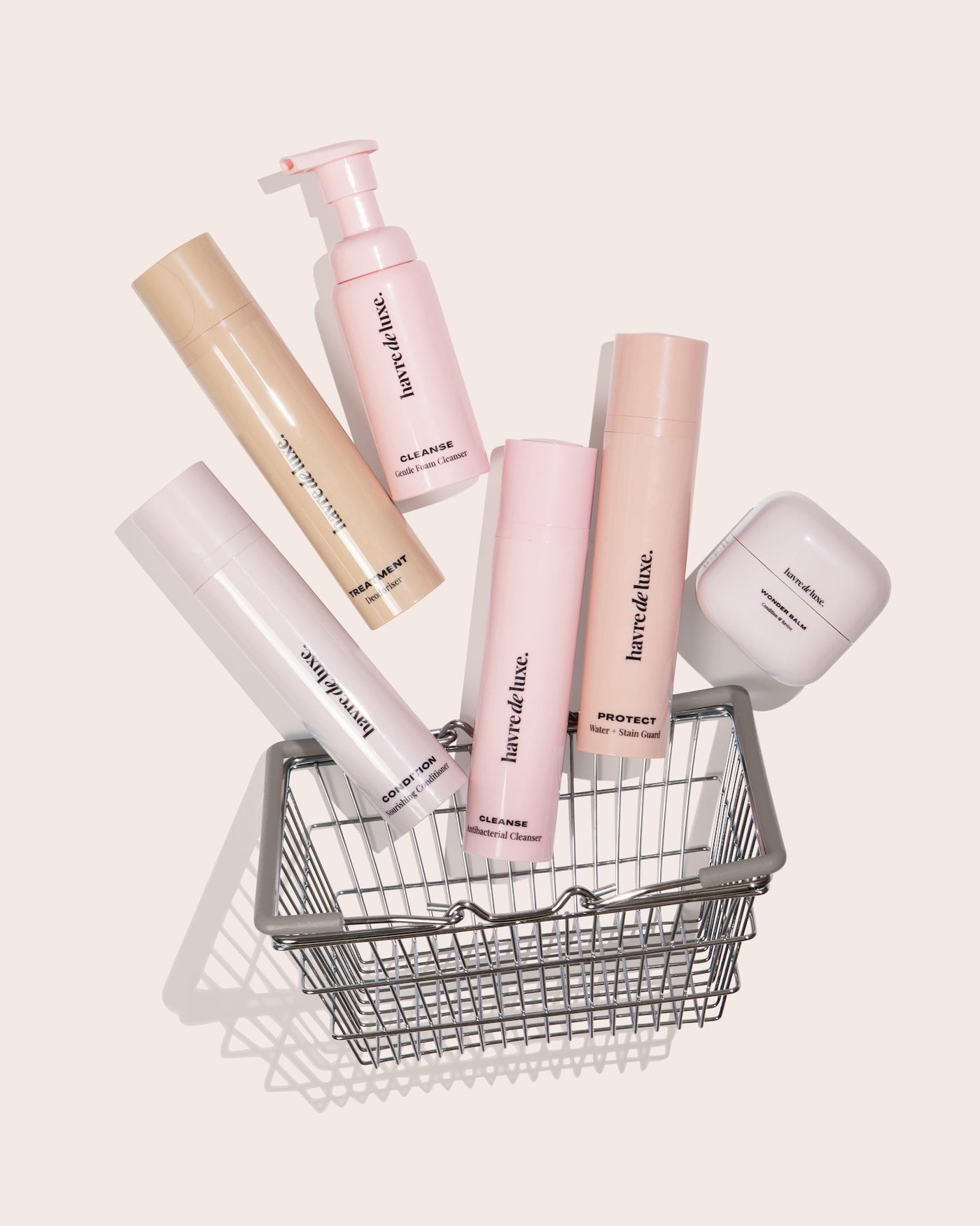 Havre de Luxe care products falling into a shopping basket